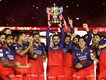 Virat Kohli and RCB teammates celebrate.